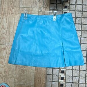 Purchased in Europe, never worn, leather mini skirt